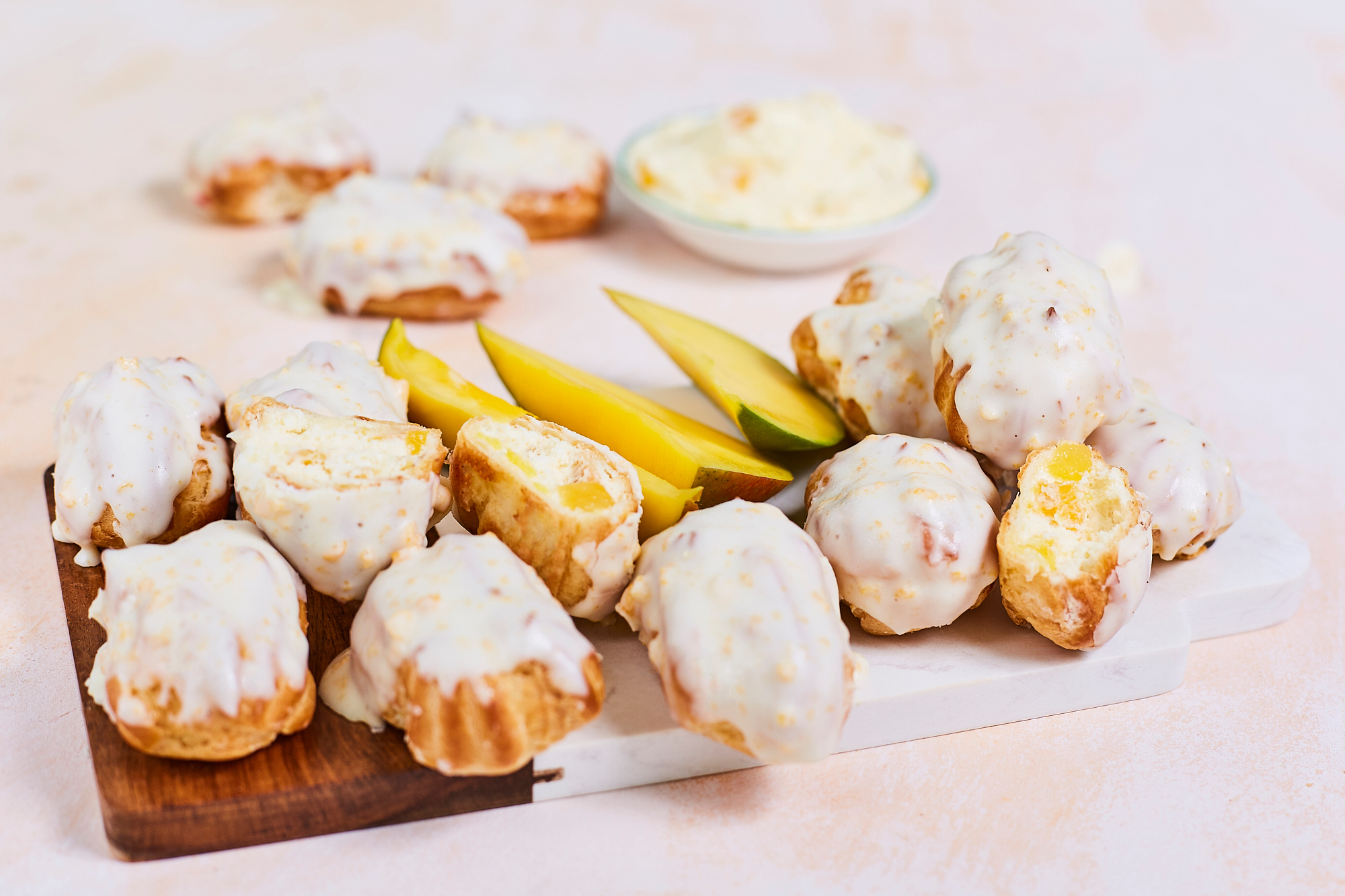 Mini eclairs with mango filling