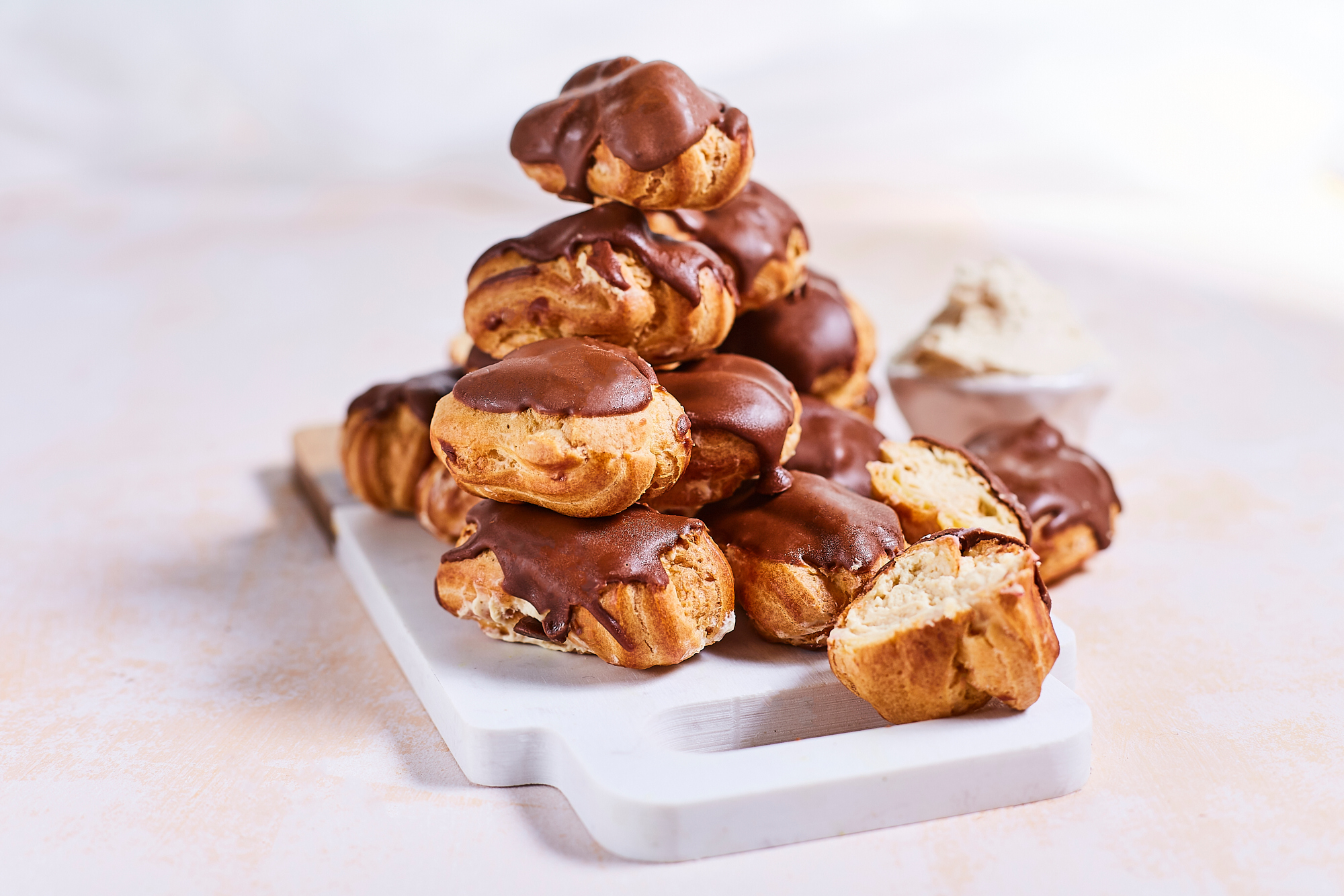 Small eclairs with caramel filling
