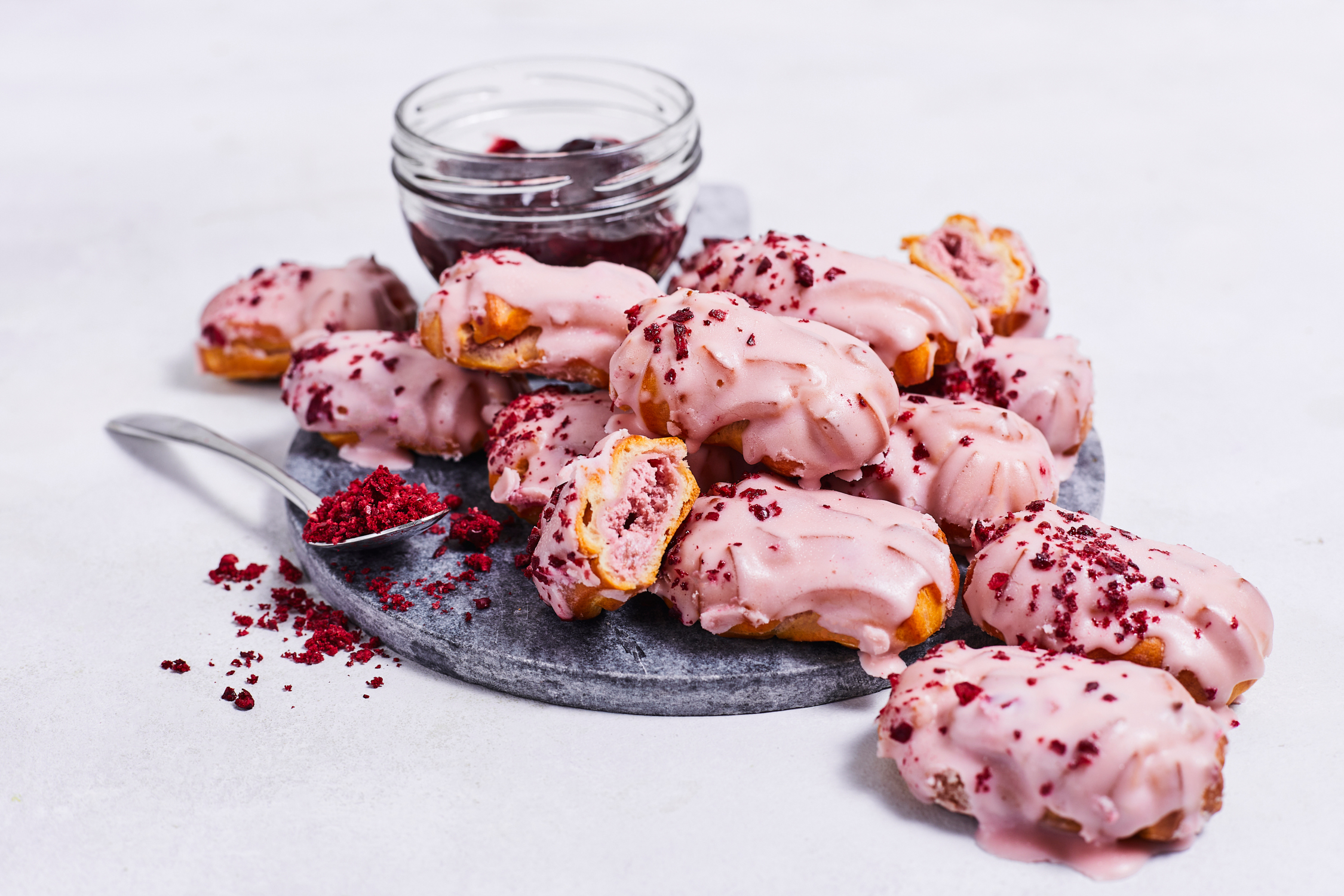 Small eclairs with cherry filling