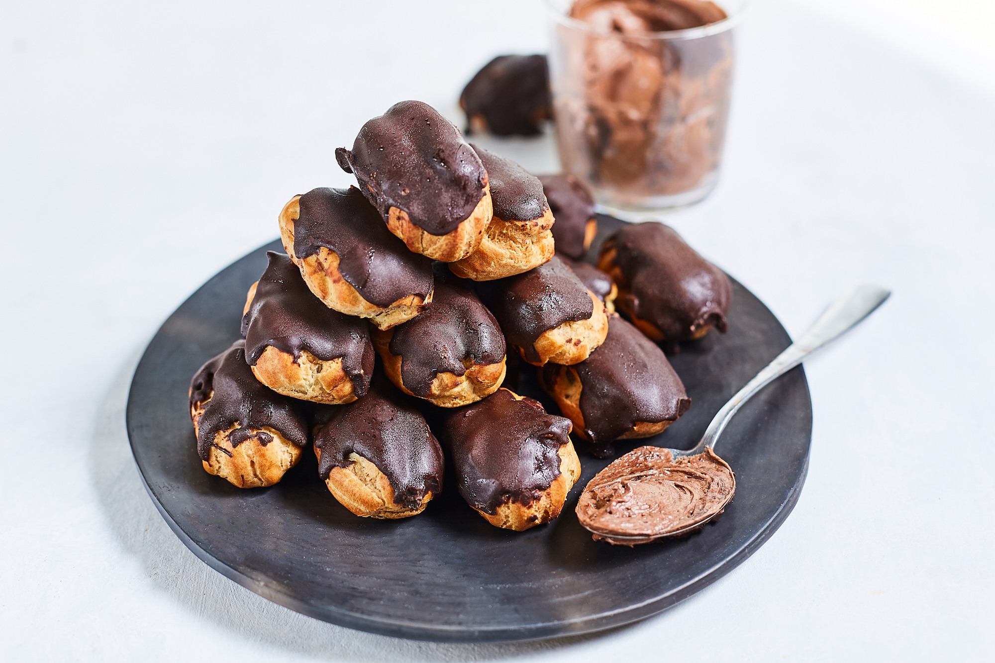 Mini eclairs with dark chocolate