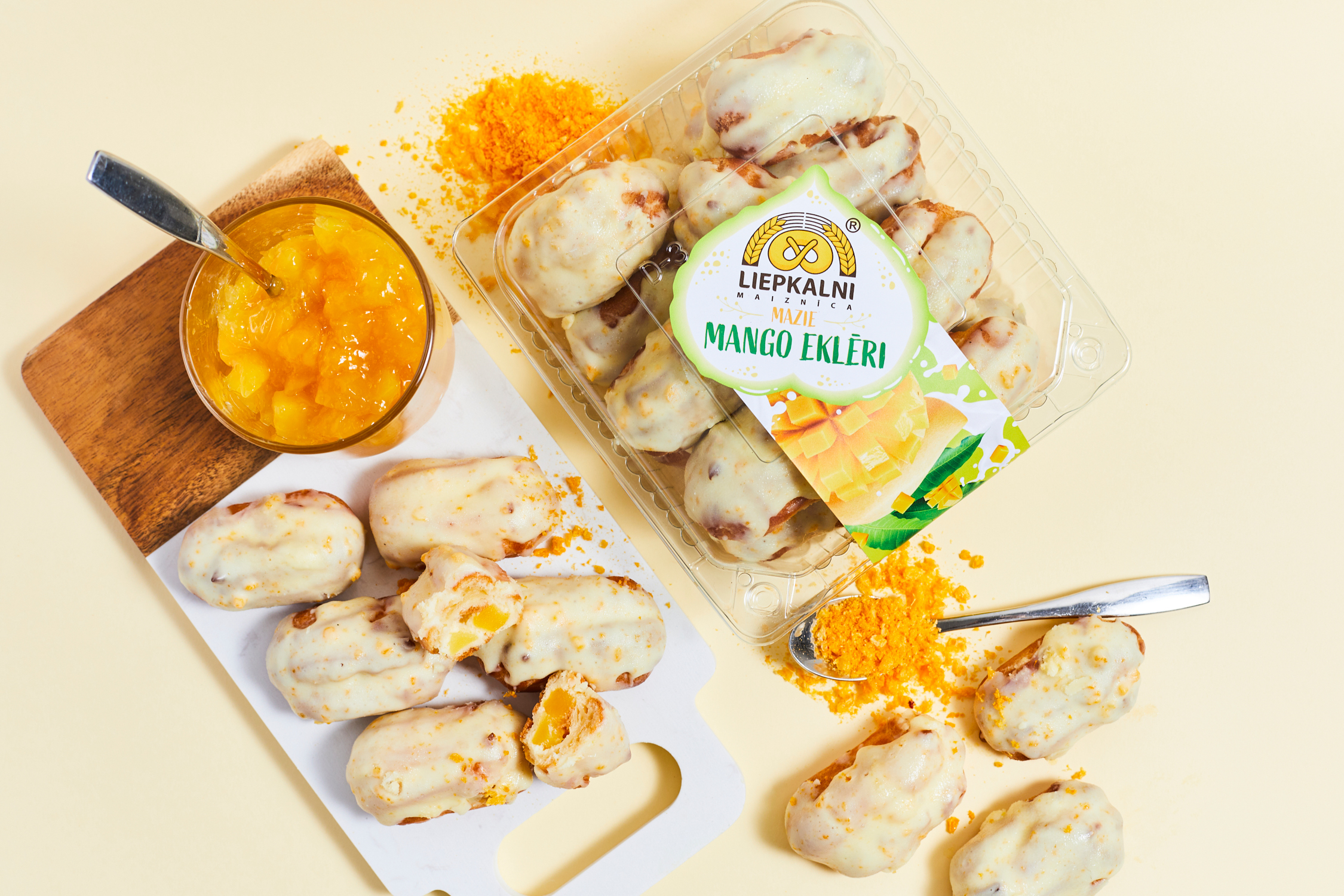 Mini eclairs with mango filling